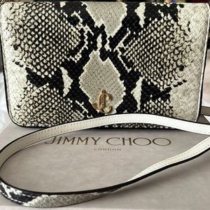Jimmy Choo snakeskin wallet on a chain